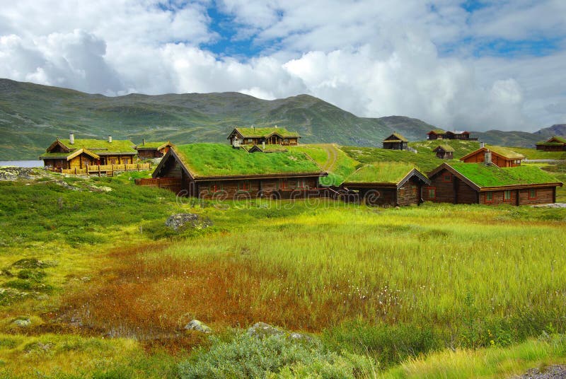 Autumn Norway landscape with huts stock image