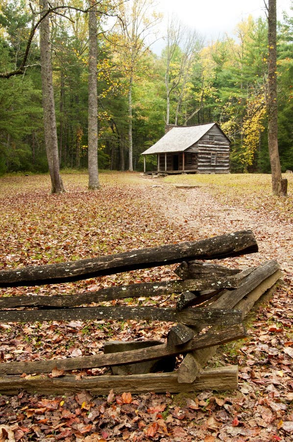 In autumn an old log cabin sits alone.