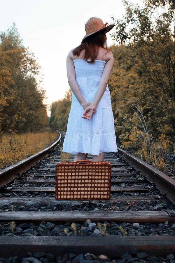 Autumn Park Girl in White Sundress and a Wicker Suitcase Walking Stock ...