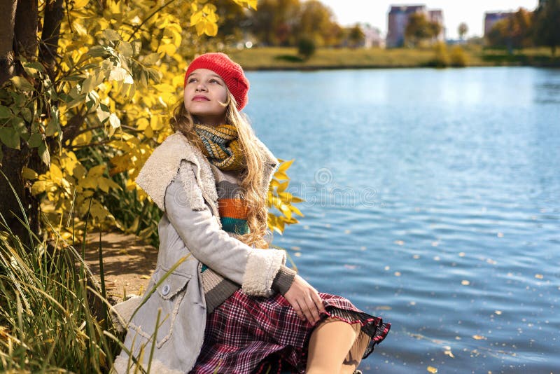 Autumn portrait of young pretty girl in red hat royalty free stock images Autumn portrait of young pretty girl in red hat royalty free stock images