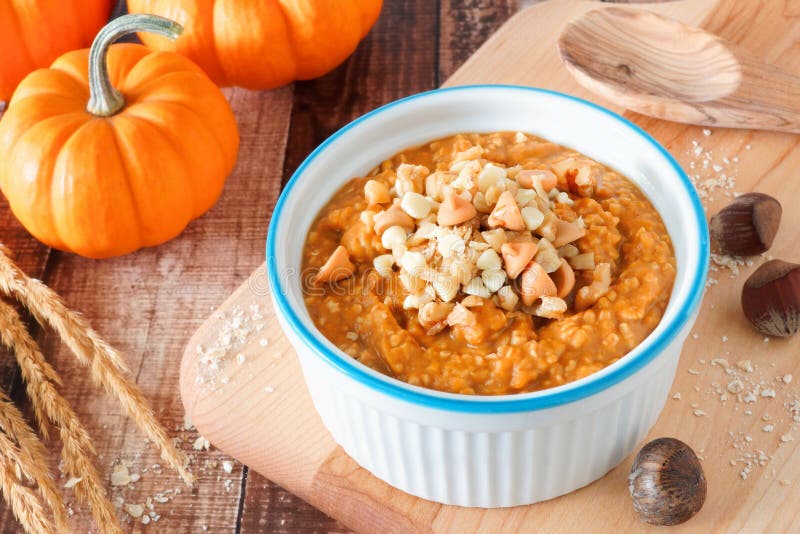 Autumn pumpkin oatmeal with walnuts, chocolate and peanut butter chips