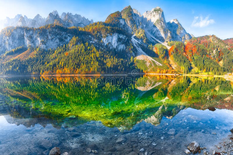 Autumn Scenery With Dachstein Mountain Summit Reflecting In Crystal