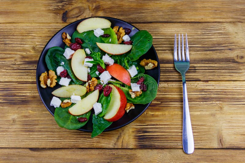Autumn Spinach Salad with Apple, Feta Cheese, Walnut and Dried