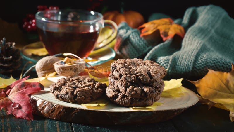 Autumn Still Life: Oatmeal Cookies, Hot Tea, and Woolen Scarf