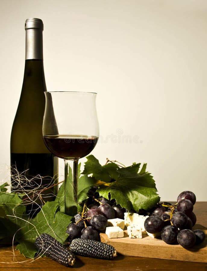 Autumn still life with wine and grapes