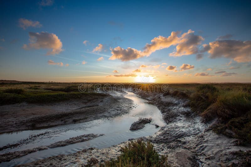Autumn sunset over the popular Norfolk coast marshes stock image Autumn sunset over the popular Norfolk coast marshes stock image