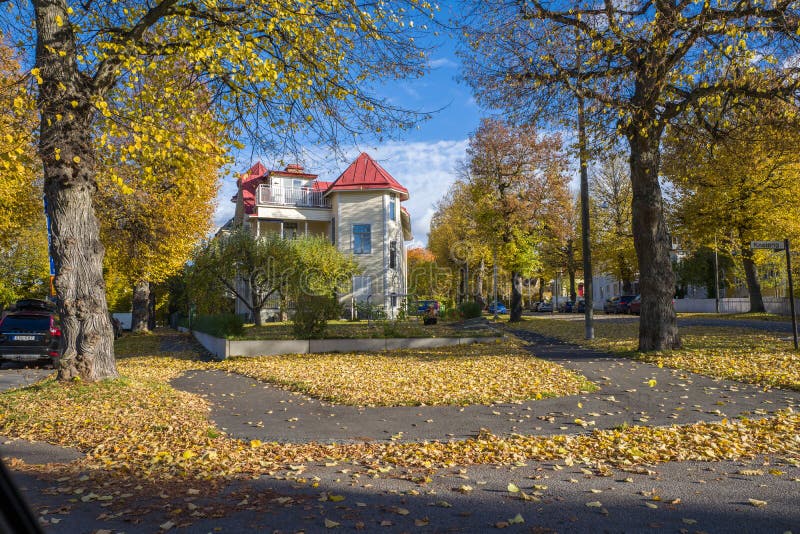 Norrkoping, Sweden - October 25, 2015: Fashionable residential area Kneippen on a sunny and colorful autumn day in Norrkoping. Norrkoping, Sweden - October 25, 2015: Fashionable residential area Kneippen on a sunny and colorful autumn day in Norrkoping.