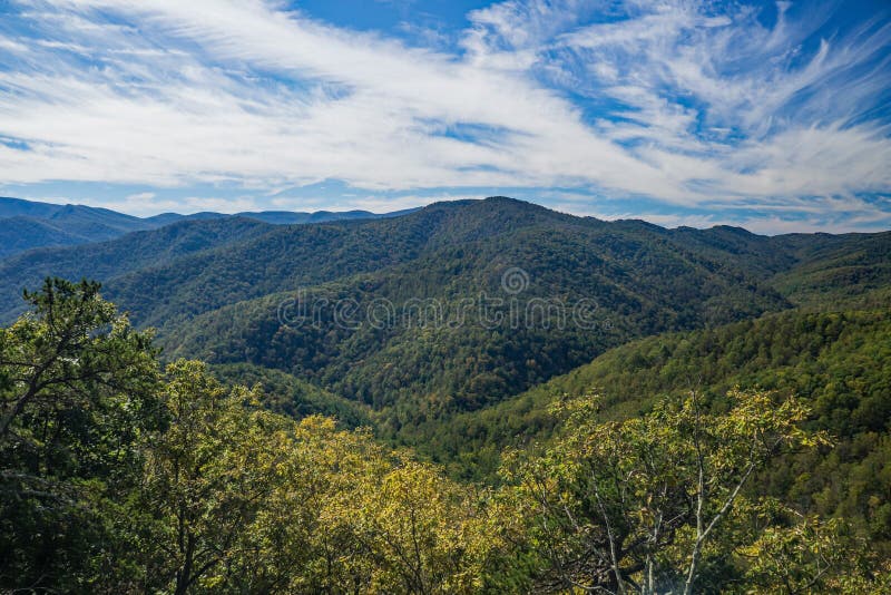 An early autumn view of the Blue Ridge Mountains from the Blue Ridge Parkway, Virginia, USA on OCT 22nd, 2018. An early autumn view of the Blue Ridge Mountains from the Blue Ridge Parkway, Virginia, USA on OCT 22nd, 2018.