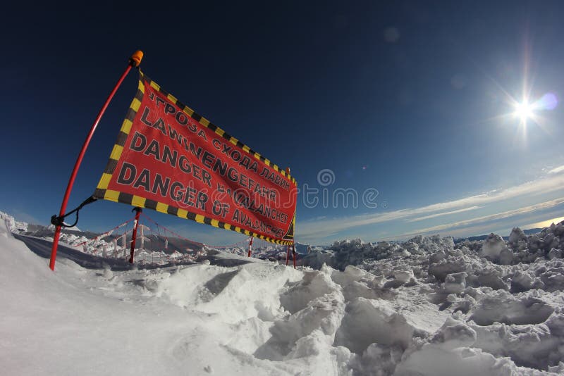 Avalanche danger sign in snow