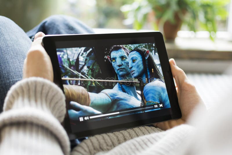 HILVERSUM, NETHERLANDS - FEBRUARY 14, 2014: Avatar is a 2009 epic science fiction action film directed, written, co-produced, and co-edited by James Cameron. The film is set in the mid-22nd century. HILVERSUM, NETHERLANDS - FEBRUARY 14, 2014: Avatar is a 2009 epic science fiction action film directed, written, co-produced, and co-edited by James Cameron. The film is set in the mid-22nd century.