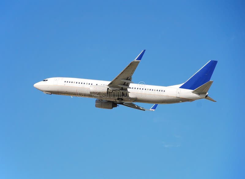 Side view of modern passenger airplane taking off. Side view of modern passenger airplane taking off