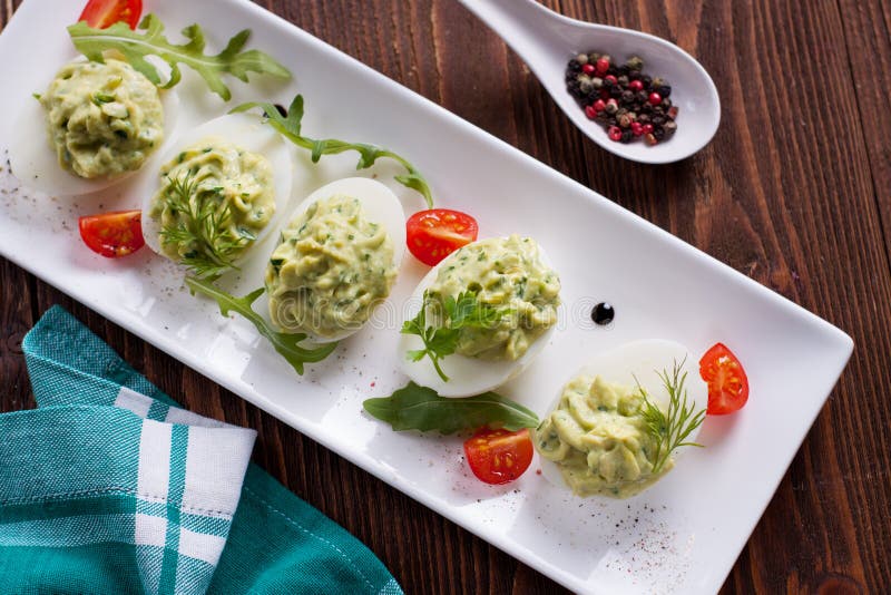 Avocado deviled eggs stock photography