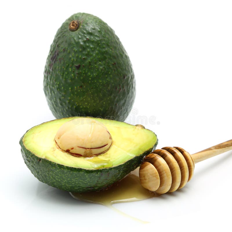 Honey dripping on Avocado stock image. Image of seed 89552433
