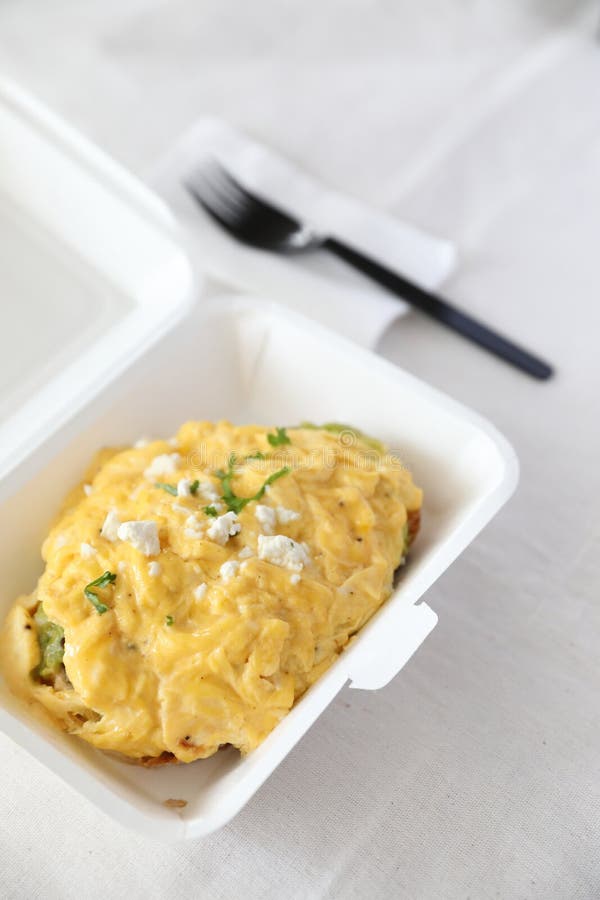 Avocado and Scrambled Eggs Toast with Delivery Package in White