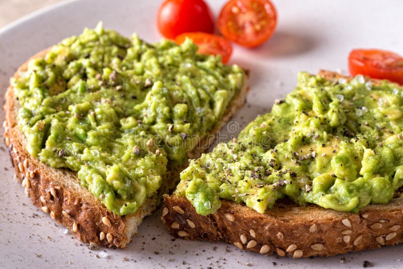 Avocadotoast stockbilder