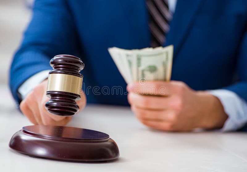 Avocat care primește bani ca mită stock photography