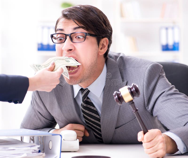 Avocatului i se oferă mită pentru serviciile sale stock photo