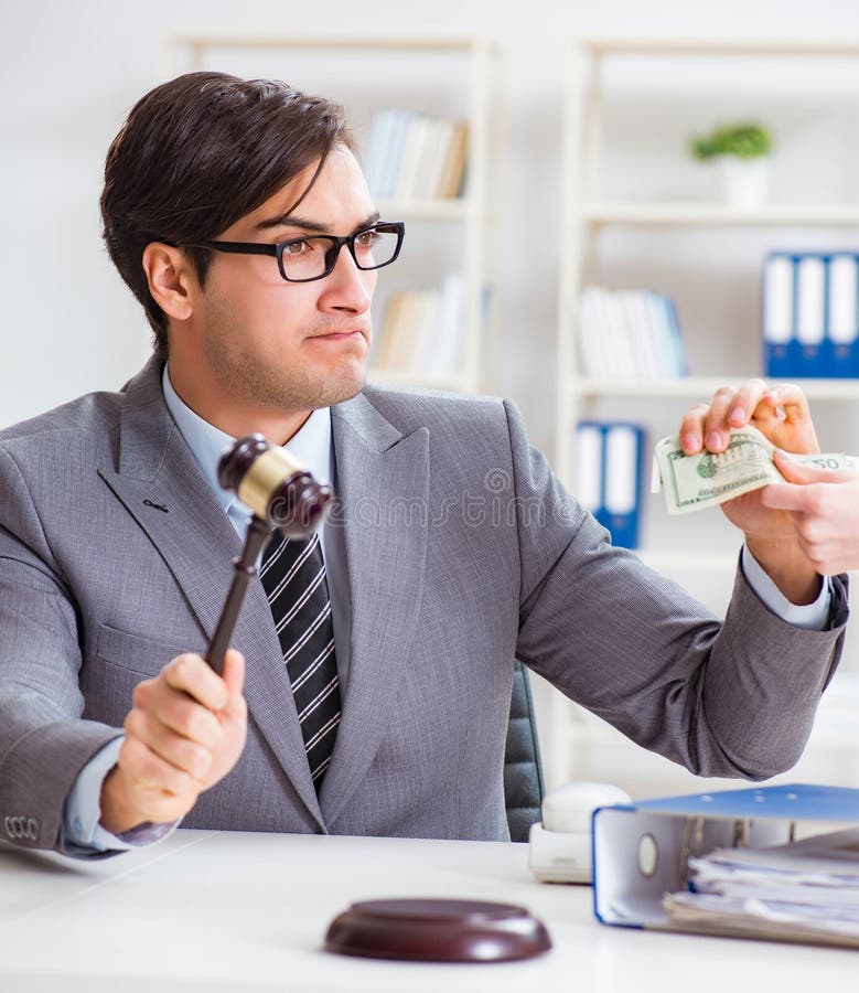 Avocatului i se oferă mită pentru serviciile sale stock photography