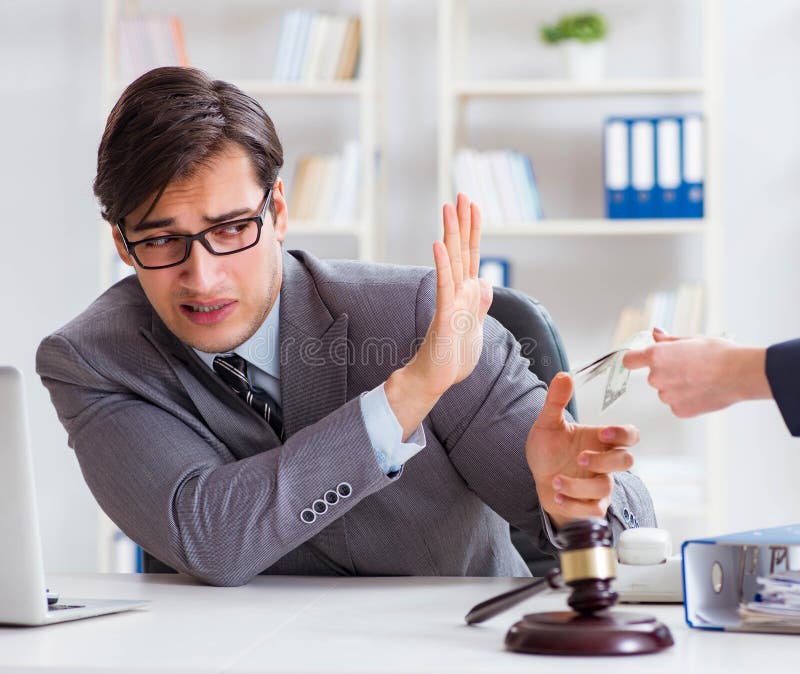Avocatului i se oferă mită pentru serviciile sale stock photo
