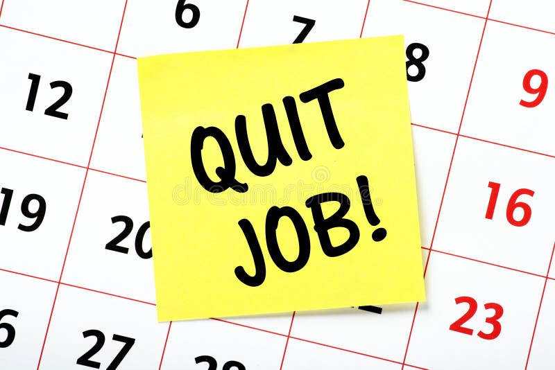 A reminder to Quit Job on a yellow sticky note attached to the page of a calendar. A reminder to Quit Job on a yellow sticky note attached to the page of a calendar