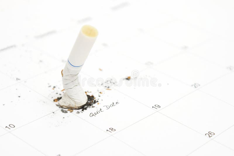 A reminder on a calendar of a smokers quit date to achieve a healthy goal. A reminder on a calendar of a smokers quit date to achieve a healthy goal.