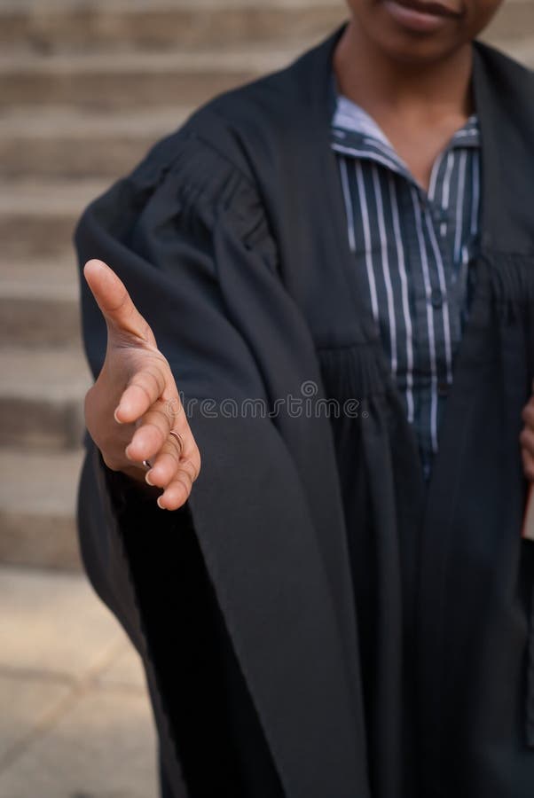 African American female woman lawyer shaking hands outside court house. African American female woman lawyer shaking hands outside court house