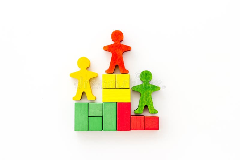 Awards podium figures of humans on white table from above copy space fotografia stock