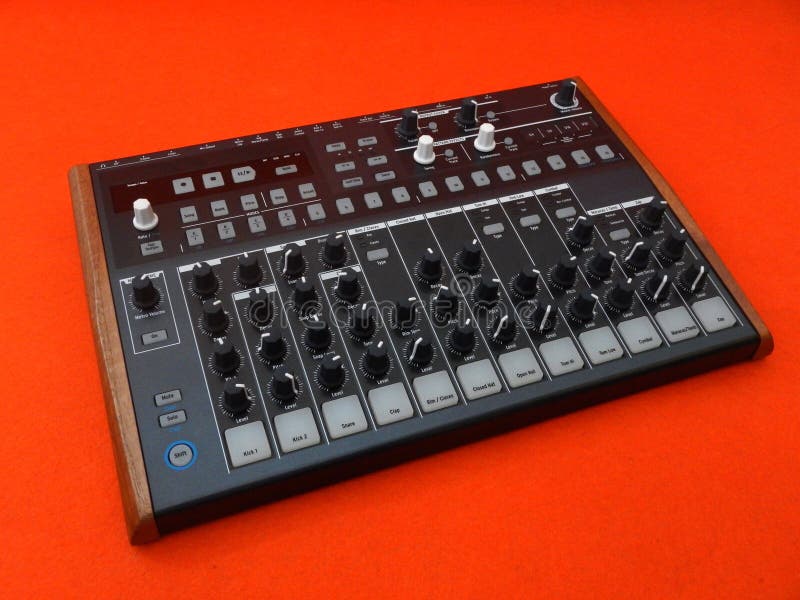 Electronic musical instrument or audio mixer or sound equalizer on a orange background analog modular synthesizer stock images