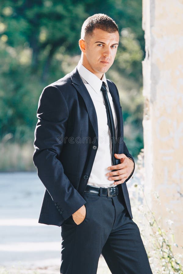 Awesome Stylish Men in Elegant Suite Posing in Abandoned Place ...