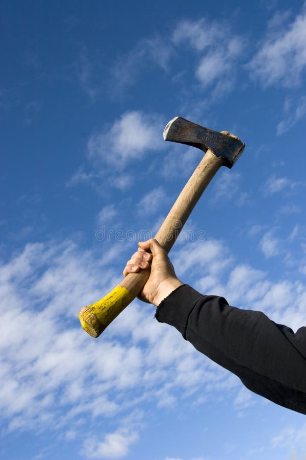 Man Sharpening an Axe on a Grinding Stone Stock Photo Image of blades