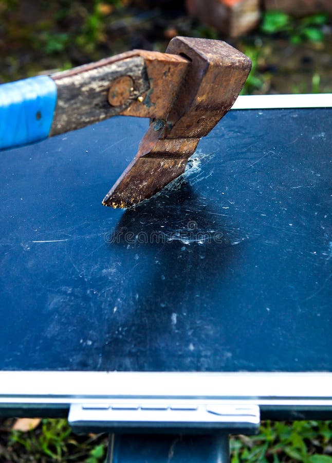 Axe and Broken Monitor royalty free stock photography