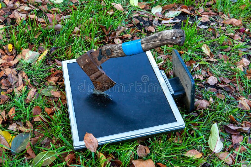Axe in the Computer Monitor royalty free stock images