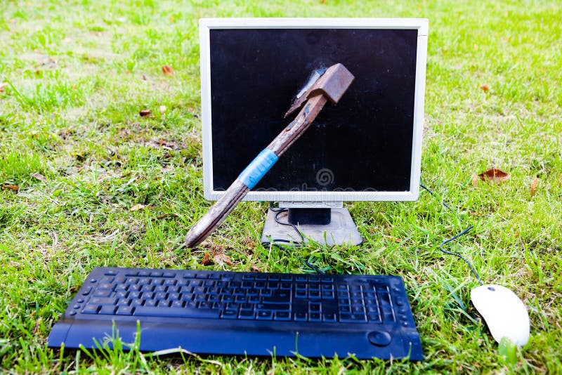 Axe in the Computer Monitor royalty free stock images