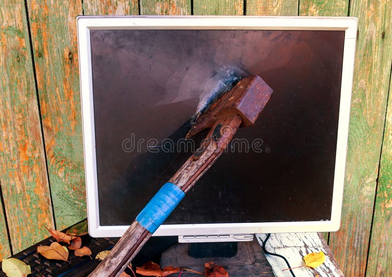 Axe in the Monitor royalty free stock photos
