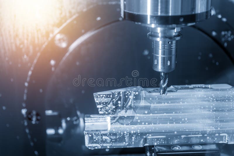 The 5-axis CNC machine cutting the aerospace part. royalty free stock images