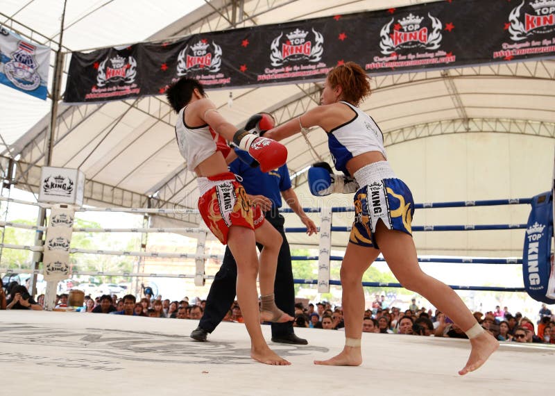 Women Thai boxing match.