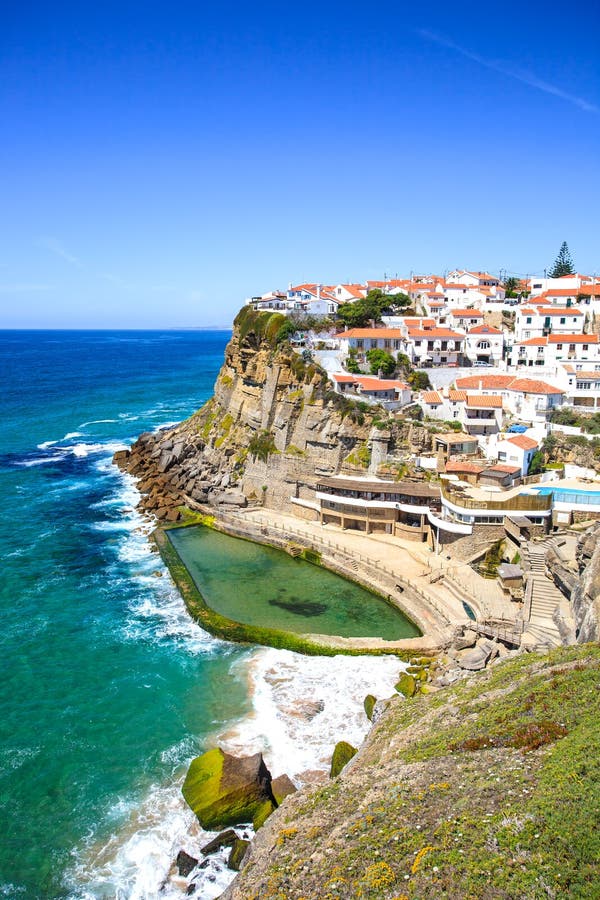 Azenhas do Mar white village landmark on the cliff and Atlantic ocean, Sintra, Lisbon, Portugal, Europe. Azenhas do Mar white village landmark on the cliff and Atlantic ocean, Sintra, Lisbon, Portugal, Europe.