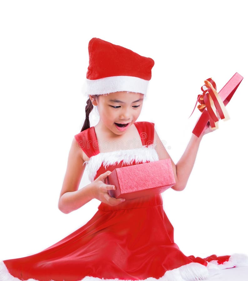 Aziatisch Kind in Kerstmanhoed met giftdoos royalty-vrije stock foto's Aziatisch Kind in Kerstmanhoed met giftdoos royalty-vrije stock foto's