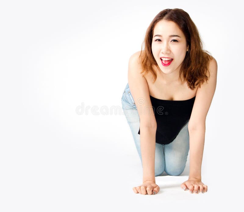 Funny face asian lady in casual suite siting on floor with copy space. Funny face asian lady in casual suite siting on floor with copy space