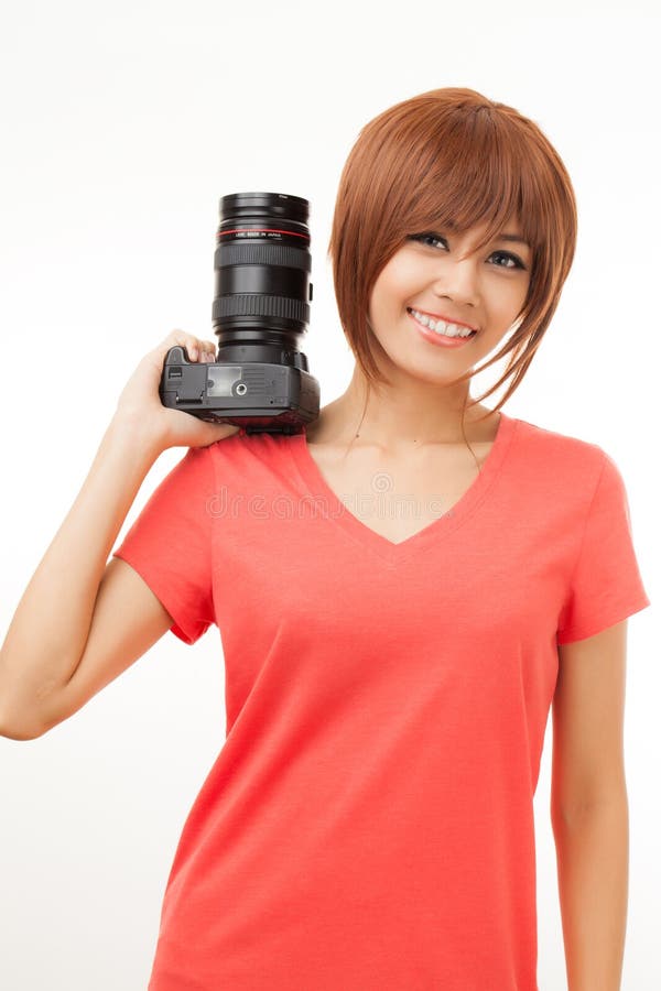 Aziatische vrouw en camera stock fotografie Aziatische vrouw en camera stock fotografie