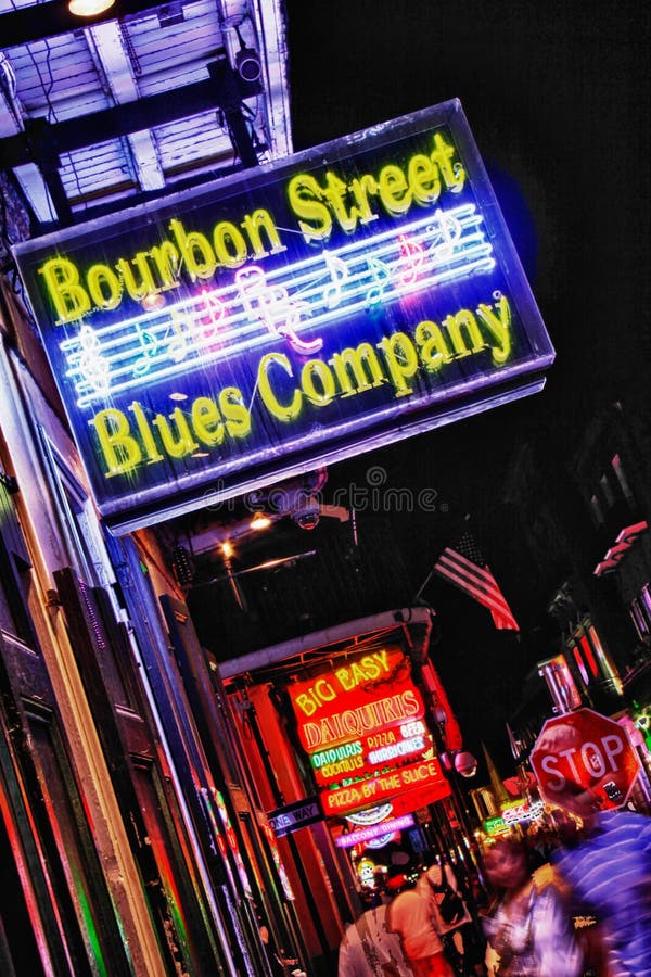 Azienda degli azzurri della via di New Orleans Bourbon fotografia stock Azienda degli azzurri della via di New Orleans Bourbon fotografia stock
