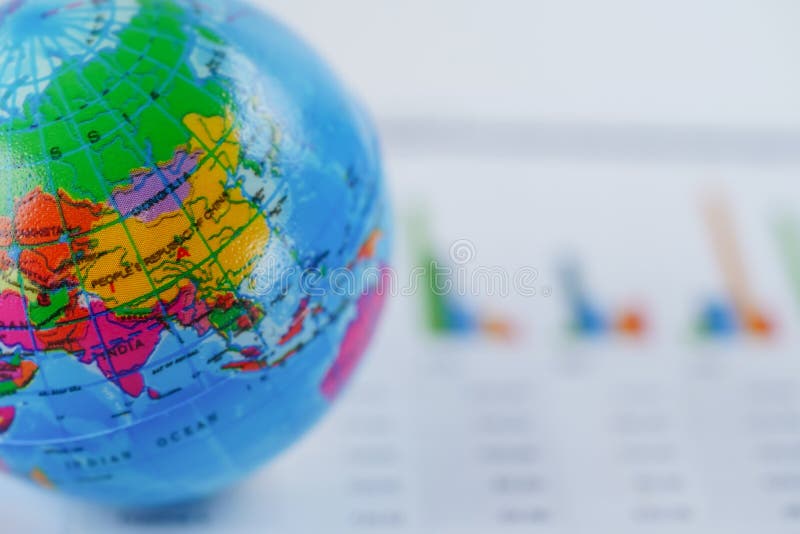 Asia globe world map on chart graph paper. Finance, Account, Statistics, Investment, Analytic research data economy and Business company meeting concept. Asia globe world map on chart graph paper. Finance, Account, Statistics, Investment, Analytic research data economy and Business company meeting concept