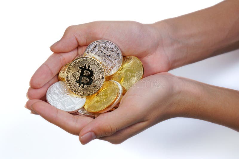 Azjatyccy potomstwa wręczają podtrzymywać wiele złotego bitcoin i srebra bitcoin w dwa ręce Zakończenie up bitcoin w otwartej ręc obraz stock Azjatyccy potomstwa wręczają podtrzymywać wiele złotego bitcoin i srebra bitcoin w dwa ręce Zakończenie up bitcoin w otwartej ręc obraz stock