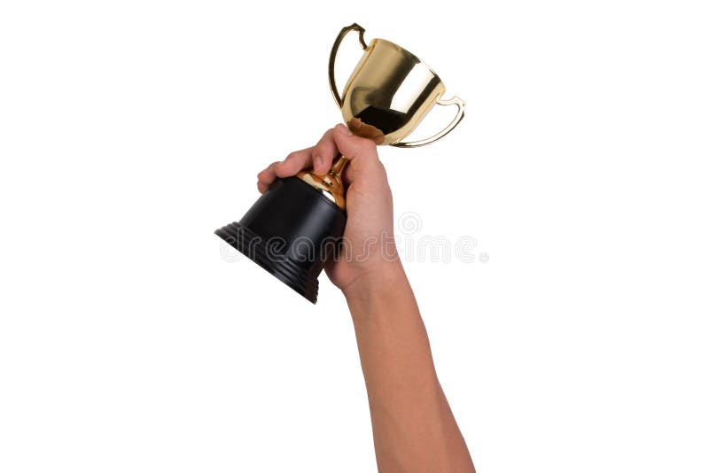 Azjatycka chłopiec trzyma złocistą trofeum filiżankę dla pierwszy miejsce mistrza nagrody odizolowywającej na białym tle obrazy stock Azjatycka chłopiec trzyma złocistą trofeum filiżankę dla pierwszy miejsce mistrza nagrody odizolowywającej na białym tle obrazy stock