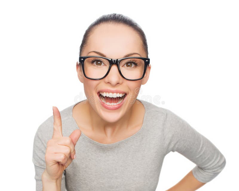 Azjatycka kobieta w eyeglasses z palcem up zdjęcie stock Azjatycka kobieta w eyeglasses z palcem up zdjęcie stock