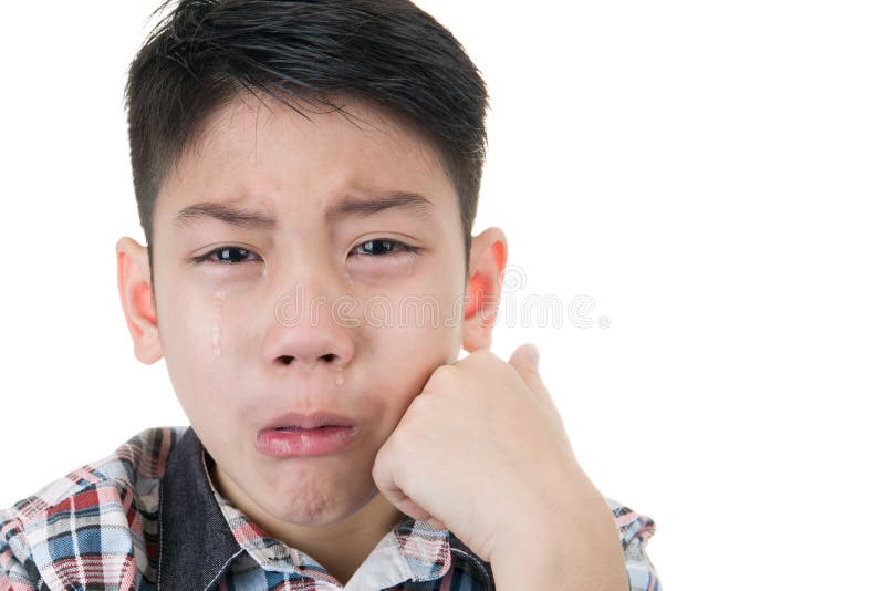 Asian cute boy sad and crying on white background. Asian cute boy sad and crying on white background