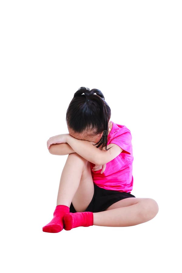 Asian child in sportwear sadden and crying at studio. Negative human emotion, facial expression feeling reaction. Isolated on white background. Asian child in sportwear sadden and crying at studio. Negative human emotion, facial expression feeling reaction. Isolated on white background.