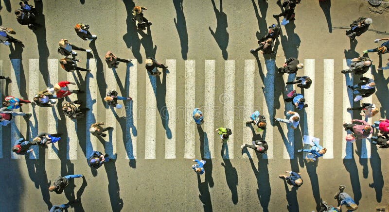 Aerial. Pedestrians on a crosswalk. Aerial. Pedestrians on a crosswalk