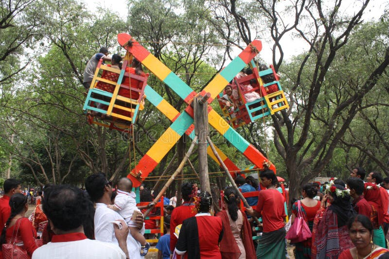 Bangladeshi children ride a merry-go-round as they celebrate the Bengali New Year or â€œPohela Boishakhâ€ in Dhaka on April 14, 2015. The Bengali calendar or .Bangla calendar is a traditional solar calendar and the year begins on Pohela Boishakh, which falls on April 14 in Bangladesh. Bangladeshi children ride a merry-go-round as they celebrate the Bengali New Year or â€œPohela Boishakhâ€ in Dhaka on April 14, 2015. The Bengali calendar or .Bangla calendar is a traditional solar calendar and the year begins on Pohela Boishakh, which falls on April 14 in Bangladesh