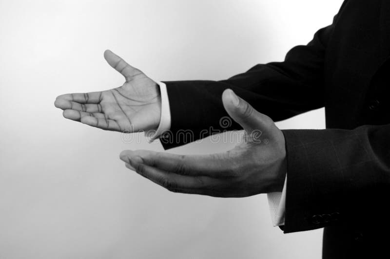 This is an image of a pair of hand offering a hand of help. Metaphor for business reach out, corporate care etc.. (Please let me know where the image will be used by leaving a message in the Comments Section/See Portfolio). This is an image of a pair of hand offering a hand of help. Metaphor for business reach out, corporate care etc.. (Please let me know where the image will be used by leaving a message in the Comments Section/See Portfolio)